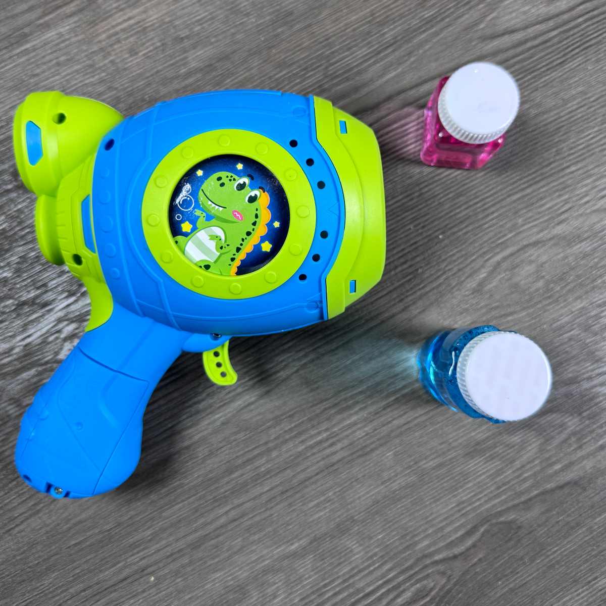 Space Dino Bubble Gun with LED Lights (15-Hole) - TodsKart