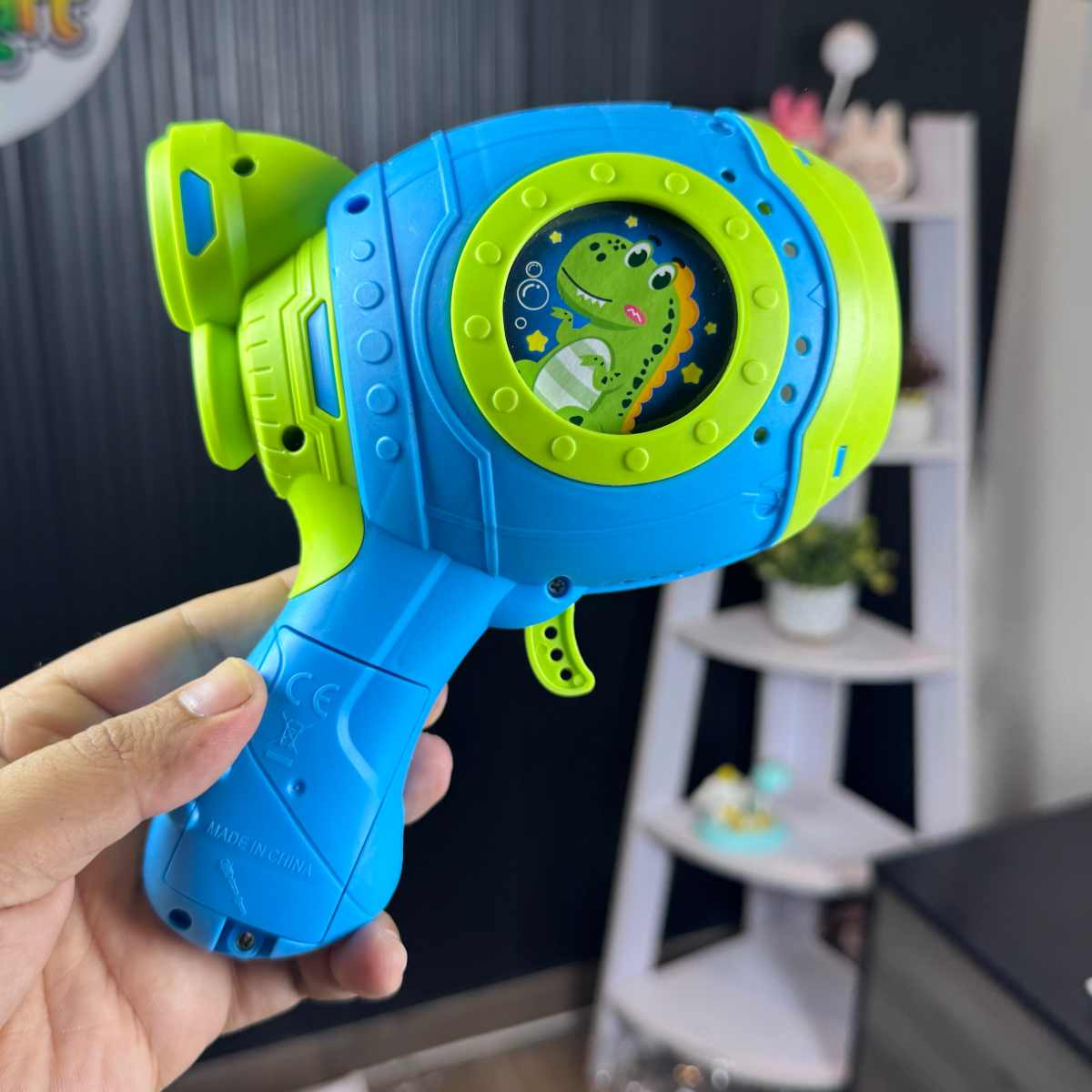 Space Dino Bubble Gun with LED Lights (15-Hole) - TodsKart